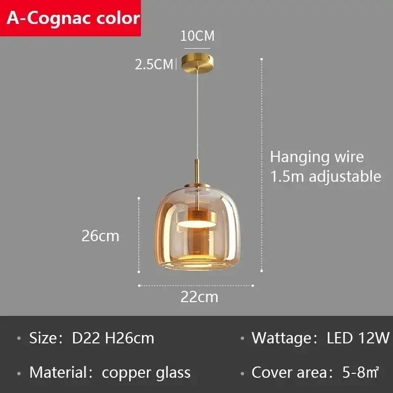 A modern pendant chandelier with warm amber glass led pendant and brass finish for dining room lighting