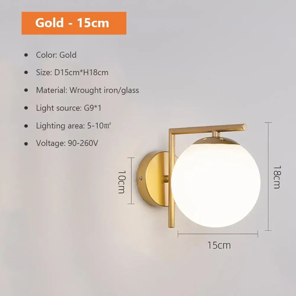 Modern spherical glass shade gold wall lamp featuring a gold-colored wrought iron frame for bedroom lighting