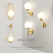 Modern spherical glass shade gold wall lamp with frosted spherical glass shades for bedroom lighting