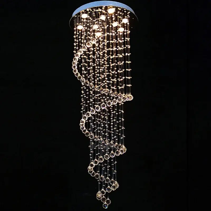 A modern spiral black and clear decorbites crystal pendant chandelier with cascading faceted beads for bedroom lighting