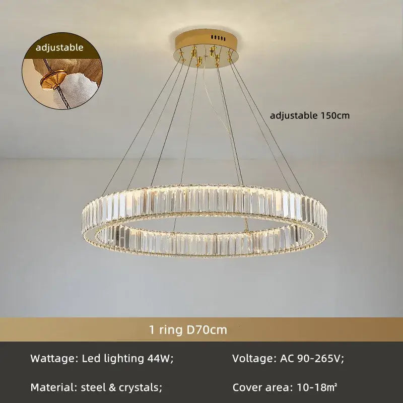 A modern spiral decorbites crystal circle led chandelier with clear crystal segments and gold-toned steel ceiling mount