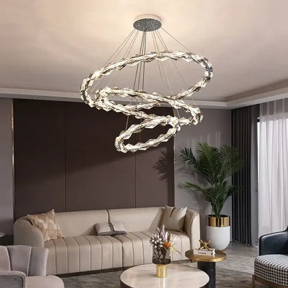 Modern spiral decorbites crystal chandelier with interlocking LED rings and sleek metallic finish for living room decor
