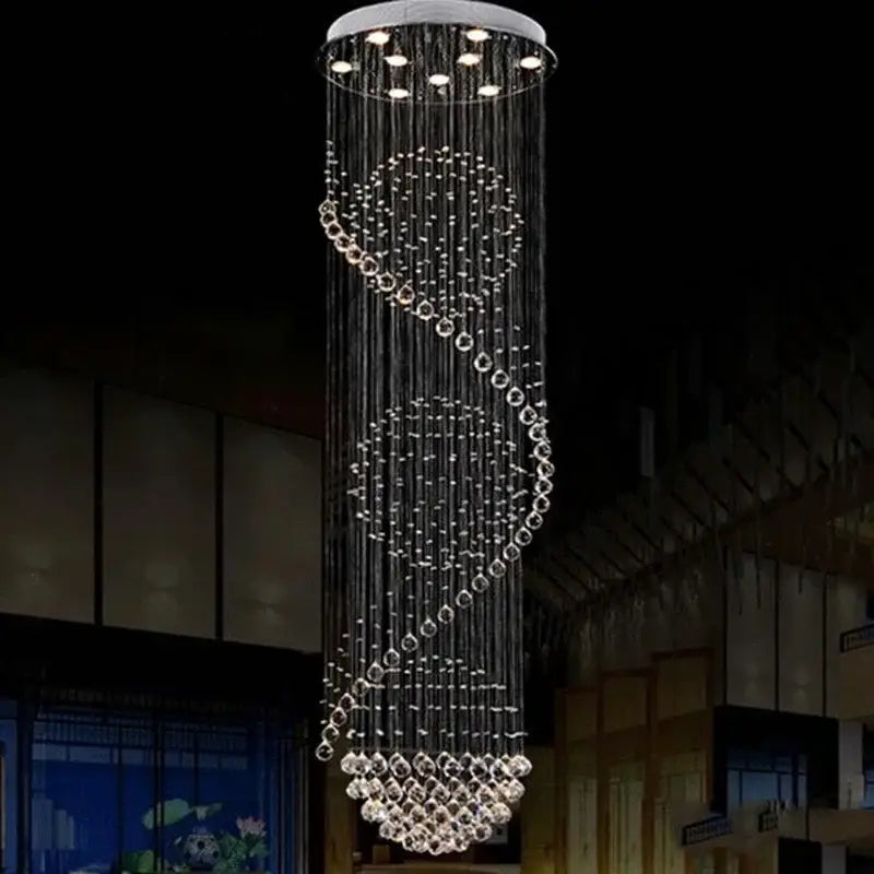 A modern decorbites crystal led chandelier with clear glass beads and circular accents for dining room light