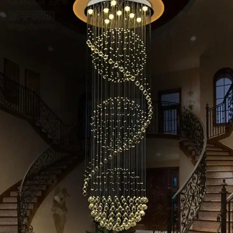A modern gold-toned decorbites crystal led chandelier with cascading illuminated beads for dining room lighting