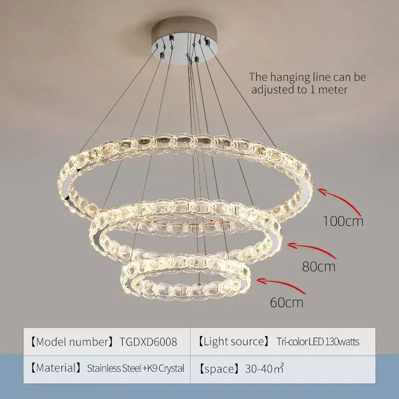 Modern spiral interlocking decorbites crystal chandelier with cascading crystal rings stainless steel frame tri-color led lighting