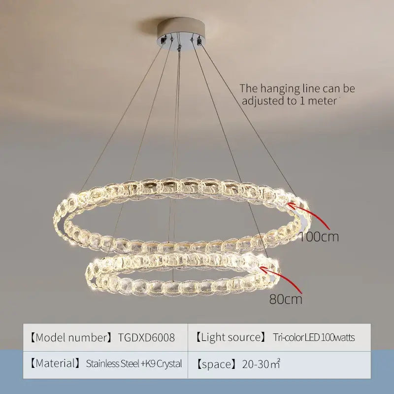 Modern spiral interlocking decorbites crystal chandelier with clear beads, stainless steel frame, and tri-color LED lighting