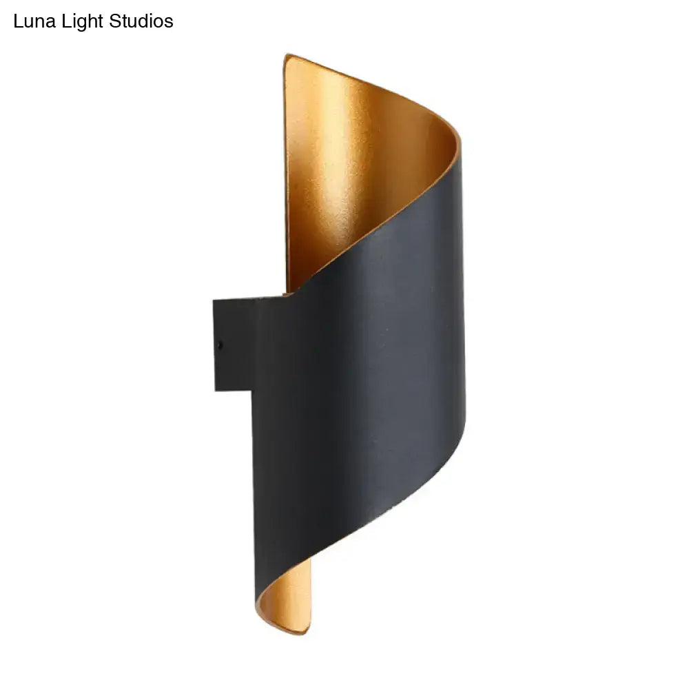 Modern spiral white and gold wall sconce with direct wired electric connection featuring matte black exterior and gold interior