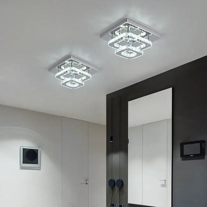 Modern square chrome crystal led ceiling chandelier featuring layered crystal rings for elegant living room decorbites decor