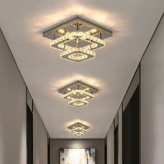 Modern square crystal flush mount ceiling light with layered crystal rings and sleek metallic frame for kitchen use