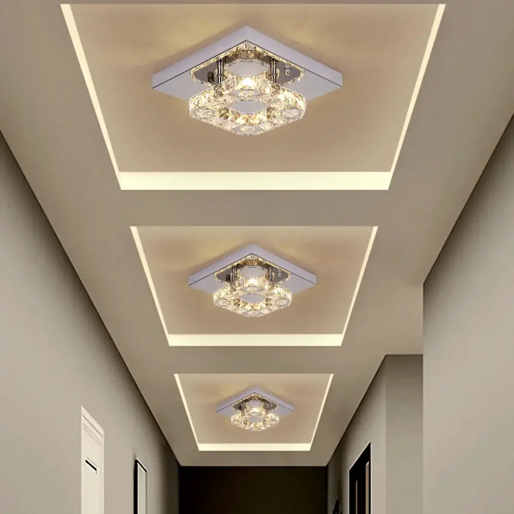 Modern square crystal led pendant chandelier with a sleek silver metal frame and clear faceted glass decorbites crystal led