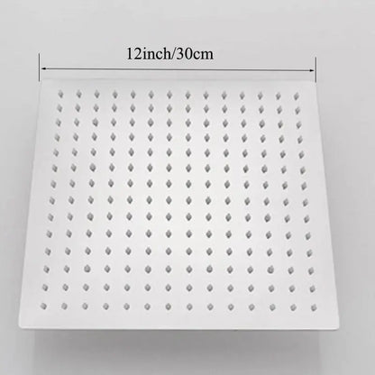 White square rain shower head with chrome finish and diamond-shaped nozzles for modern bathroom rainfall spray