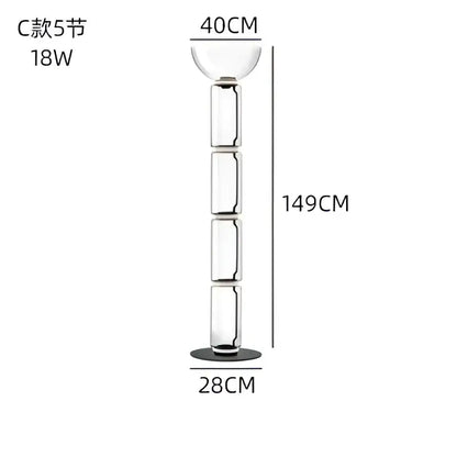 Modern stacked glass led floor lamp with clear segmented glass and black base for elegant living room lighting