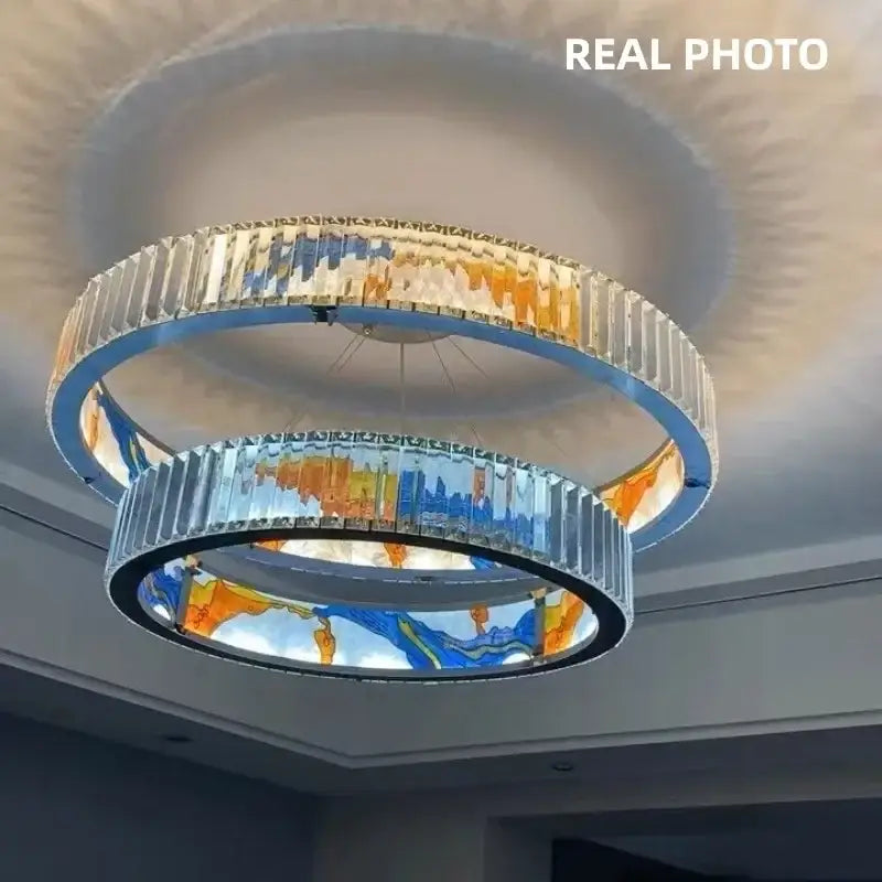 Modern stained glass circle steel led pendant chandelier with clear crystal rods and vibrant blue orange panels for living room decorbites circle steel