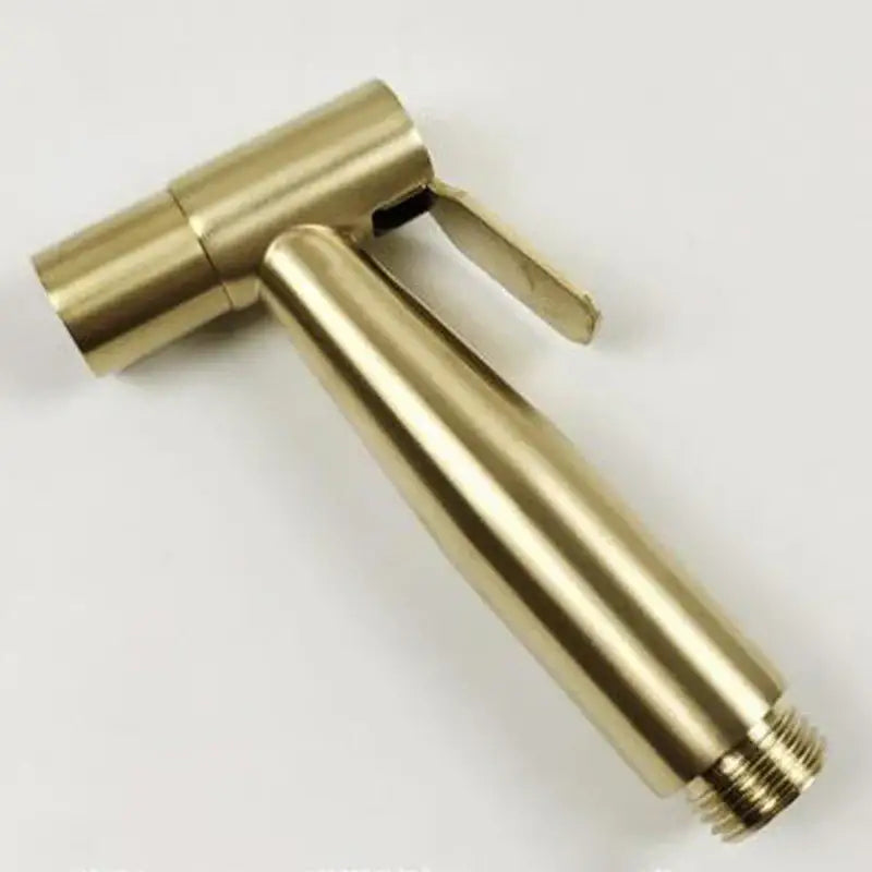Brass-colored sleek handheld shower nozzle with polished finish and threaded base in decorbites bidet washbasin mixer set