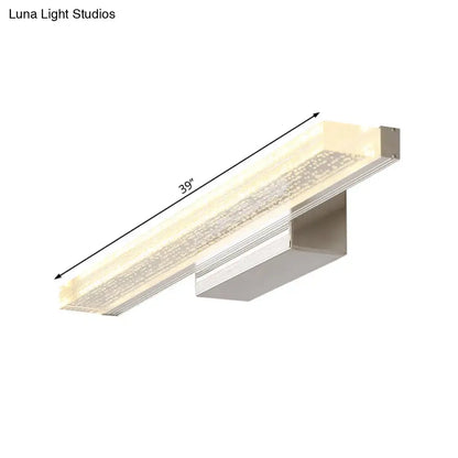Modern 39-inch stainless steel led bathroom light with sleek metallic finish and frosted textured glass panel