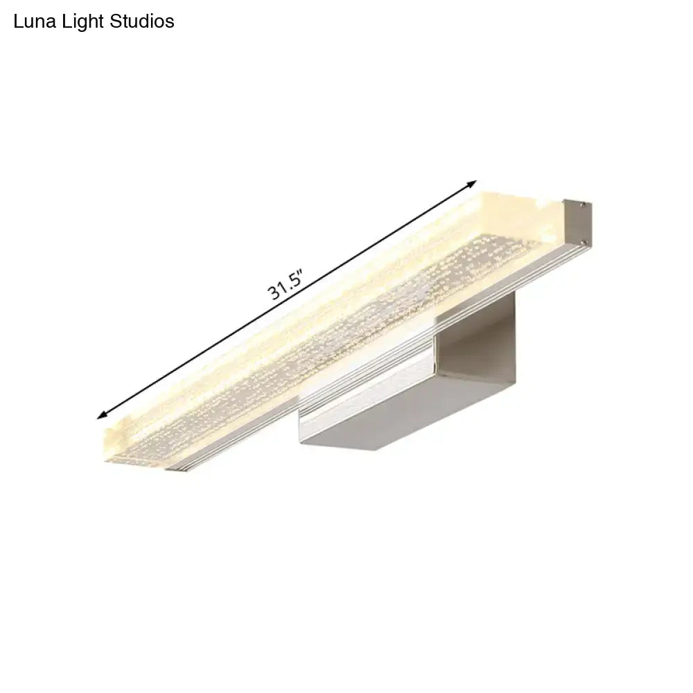 Modern stainless steel led bathroom light with frosted shade, silver metallic finish, and sparkling crystal accents