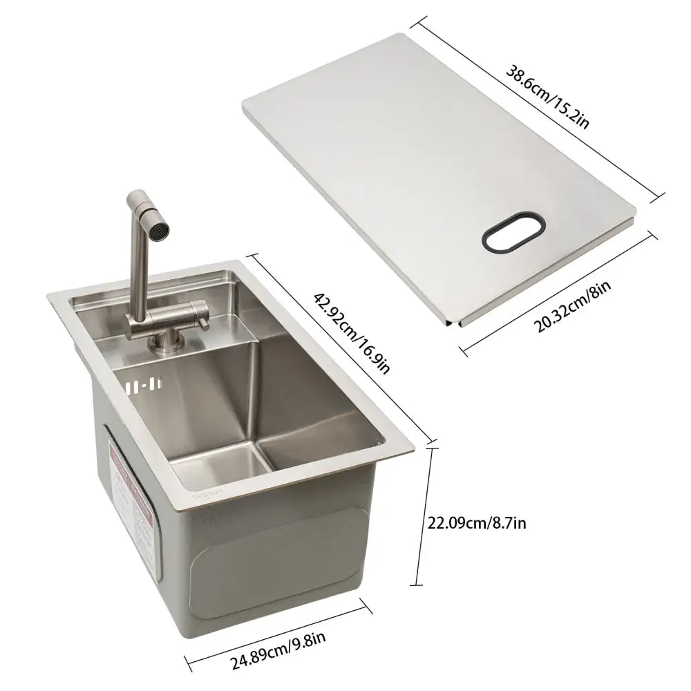Modern stainless steel single bowl undermount kitchen sink with matching rectangular cutting board and faucet