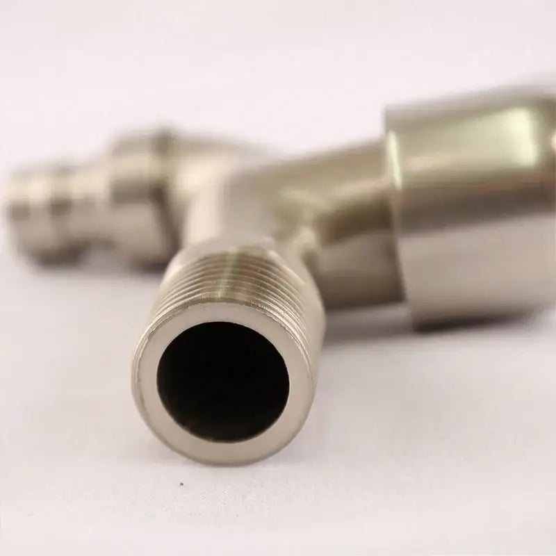 Shiny metallic stainless steel t-shaped wall mounted single hole pipe fitting with threaded ends and reflective surface