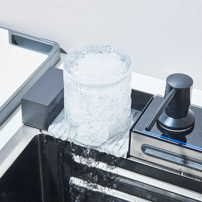 Clear textured glass ice cube tray designed for modern stainless steel waterfall kitchen sink with digital display