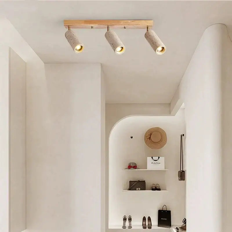 Modern stone and wood 3-head led ceiling spotlight with concrete finish mounted on light wood bar for living room