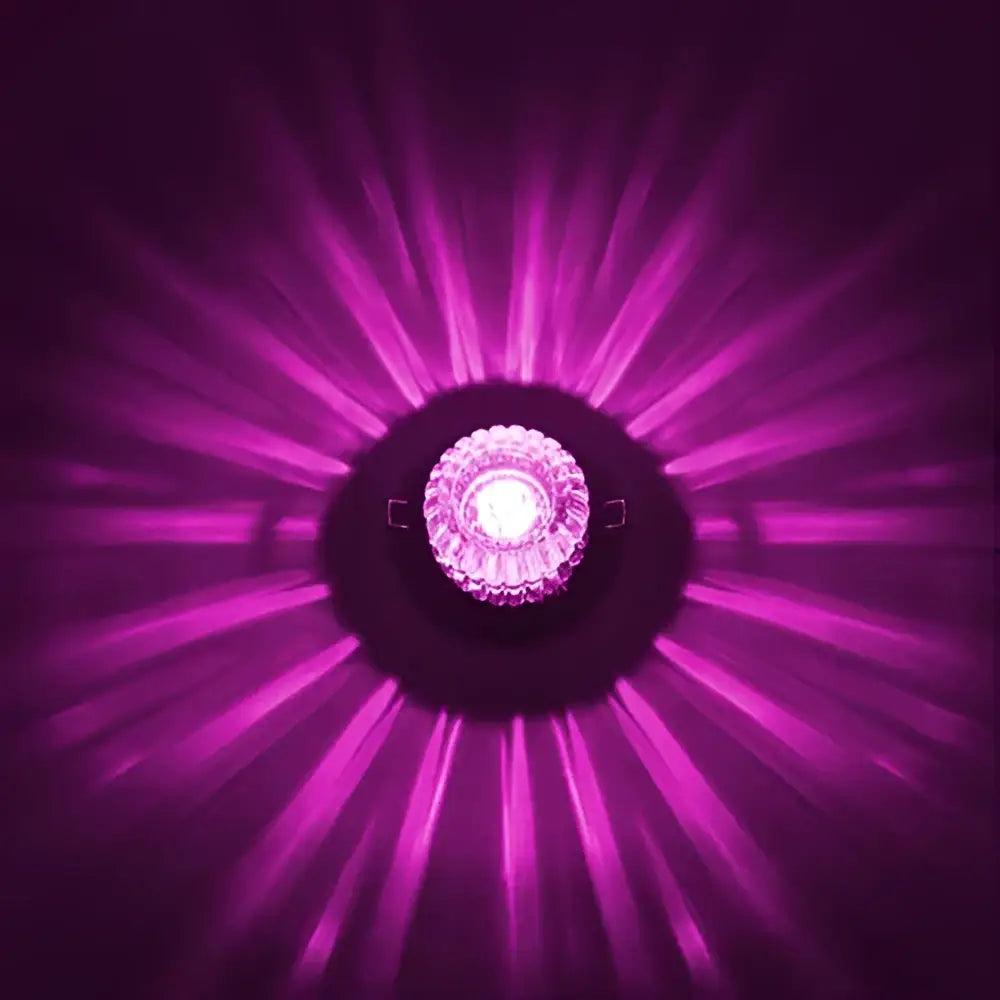 Modern sunburst crystal led flush mount ceiling light with crystal decorbites emitting vibrant purple rays for living room