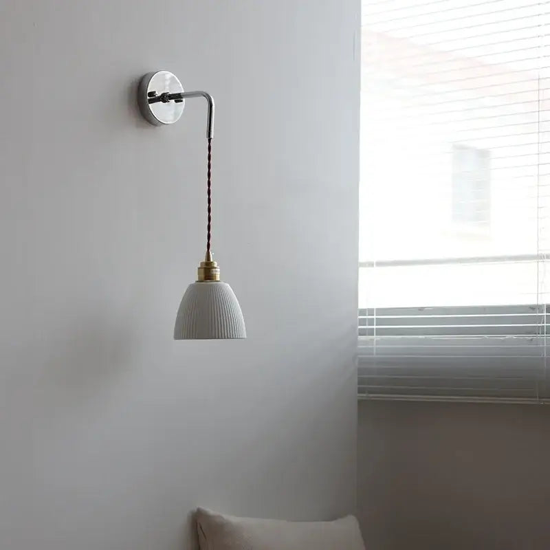 Modern sunset glass led wall sconce with white ribbed ceramic pendant light and brass-finished decorbites ceramic led fixture