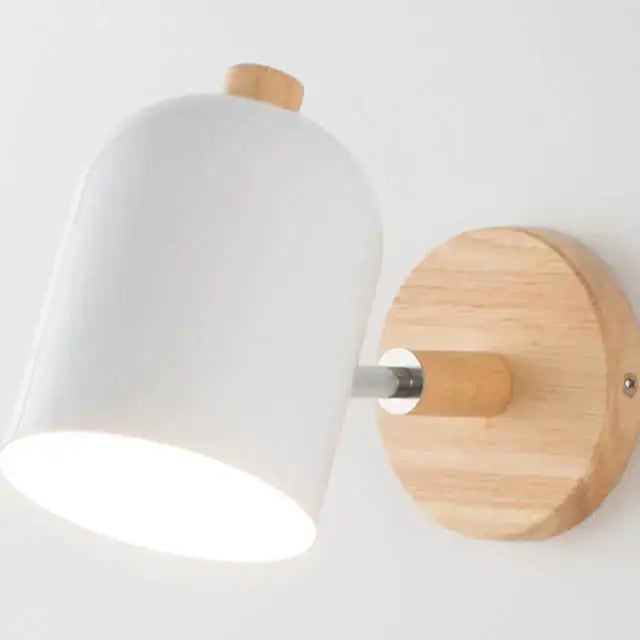 Modern teal and wood wall lamp with white ceramic lampshade wooden base and metal arm for bedroom use