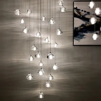 Modern teardrop decorbites crystal led chandelier with multiple glass orbs suspended by metallic cords for living room decor