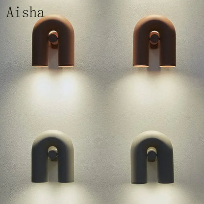 Aisha brand led u-shaped wall lamp in matte brown and gray ceramic with minimalist design for modern bedrooms