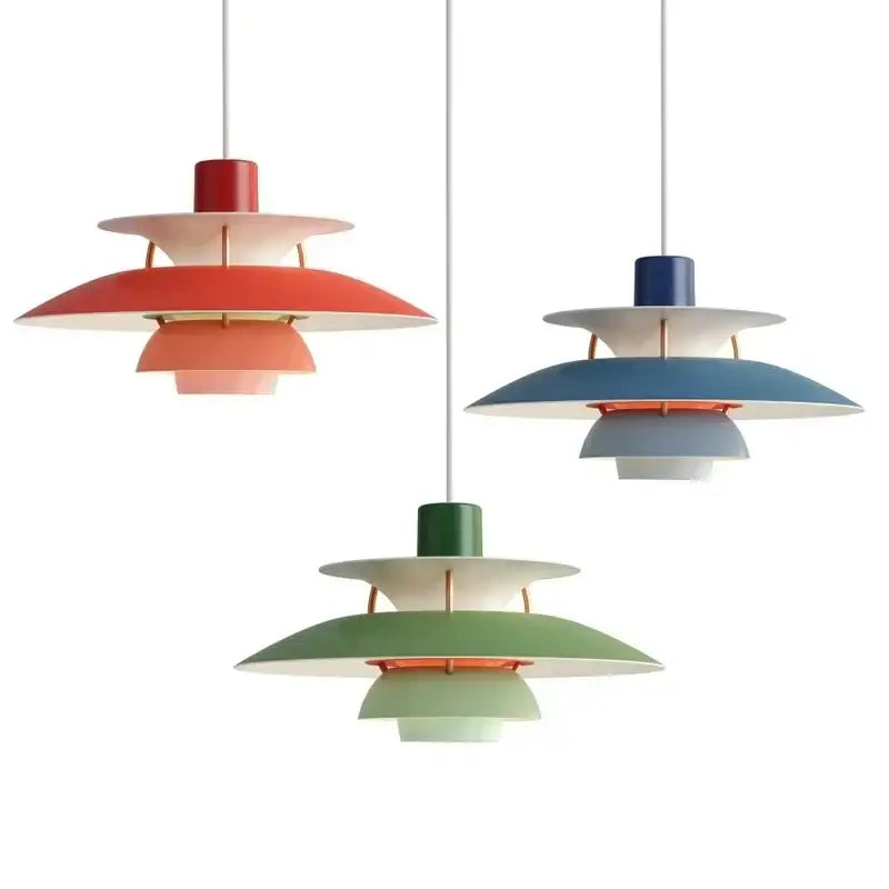 Three modern tiered colorful metal hanging lights with copper accents for dining room suspension lamp by decorbites danish designer