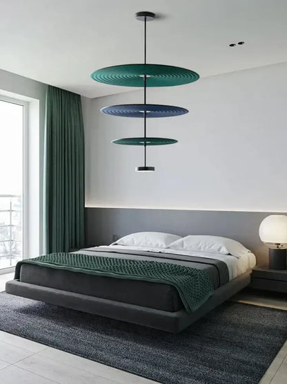 Modern tiered cotton round led pendant lights with teal and navy blue concentric rings suspended by a black rod decorbites cotton round
