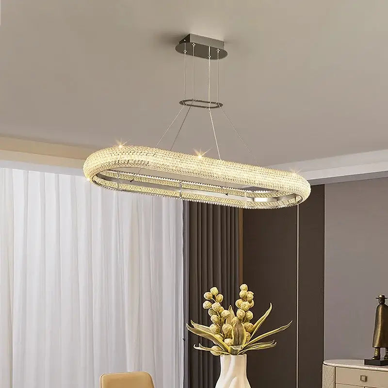 Modern tiered elegant chrome crystal chandelier with oval metallic frame and crystal accents for dining room decorbites elegant chrome