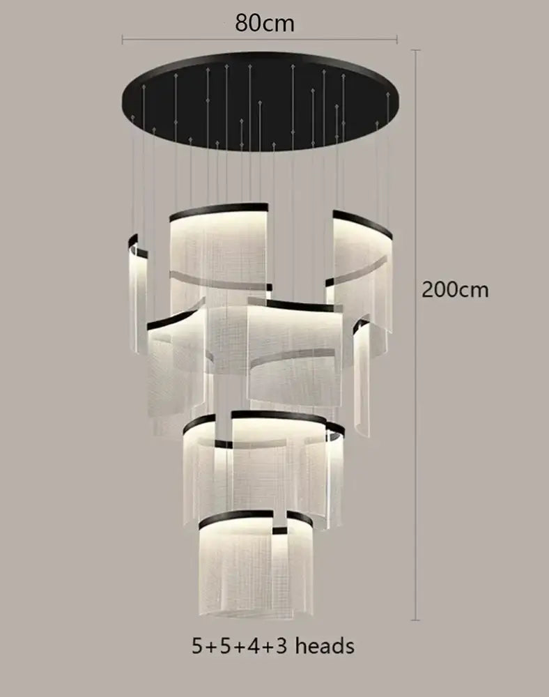 Modern black and white tiered gold led ceiling chandelier with illuminated circular heads for elegant dining room lighting