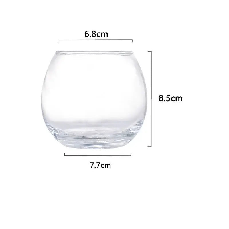 Clear glass coffee mug with rounded bulbous shape and flared rim for kitchen and dining room use