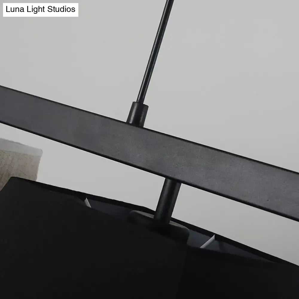 Black metal chandelier hanging lamp with modern design for contemporary island light ceiling light by DecorBites