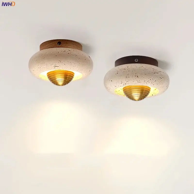 Two modern decorbites led ceiling lamps with speckled beige concrete shades brass centers and walnut rings