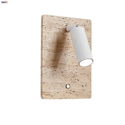 Modern travertine and white led wall light with textured beige stone base for bedroom reading by decorbites led wall