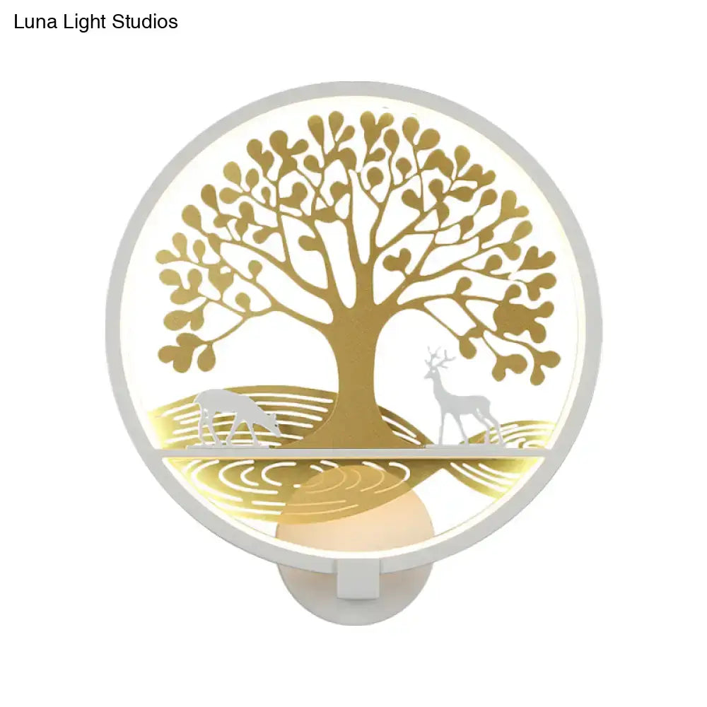 Modern wall lamp with a golden tree of life and deer design on a softly glowing white background for bedroom use