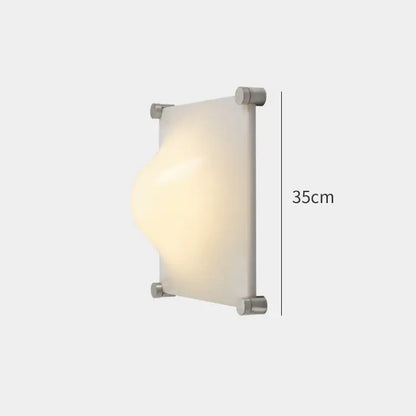 Modern triangular cream style wall lamp with frosted glass shade and brushed metal frame for bedroom decorbites cream style