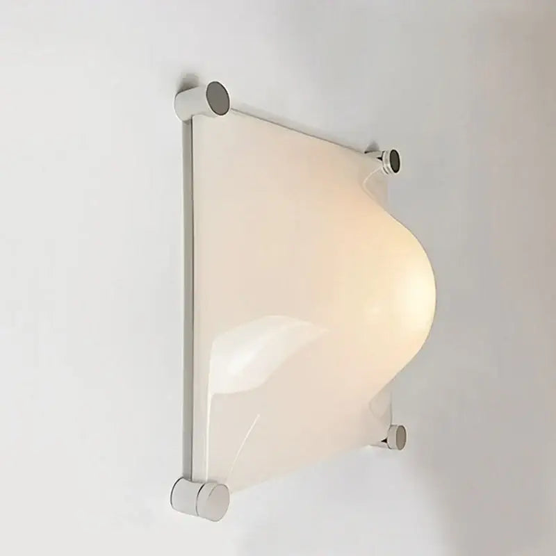 Modern triangular cream style wall lamp with frosted glass shade and chrome frame for bedroom decorbites cream style decor
