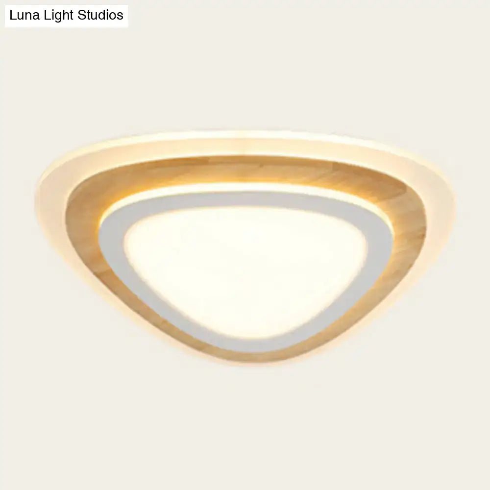 Modern triangular DecorBites kids room LED flush mount ceiling light with warm wood finish and soft white acrylic illumination