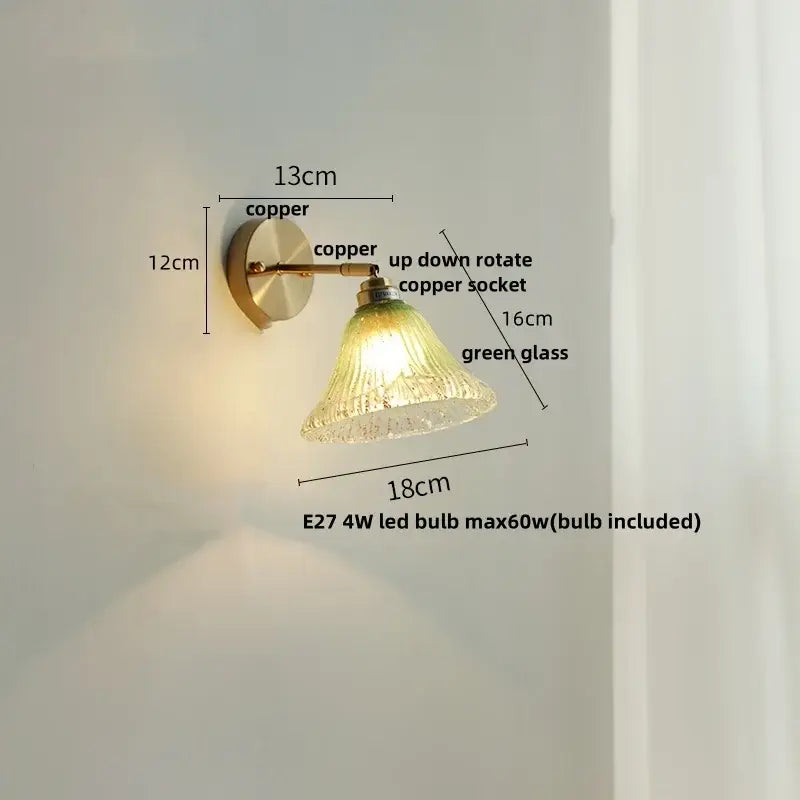 Modern turquoise blue glass wall sconce with copper finish metal arm and rotating socket featuring decorbites blue glass shade