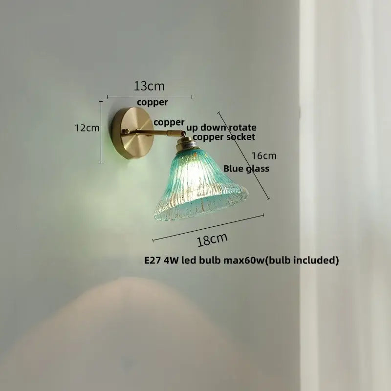 Modern turquoise blue glass wall sconce with copper finish and rotatable socket featuring decorbites blue glass shade