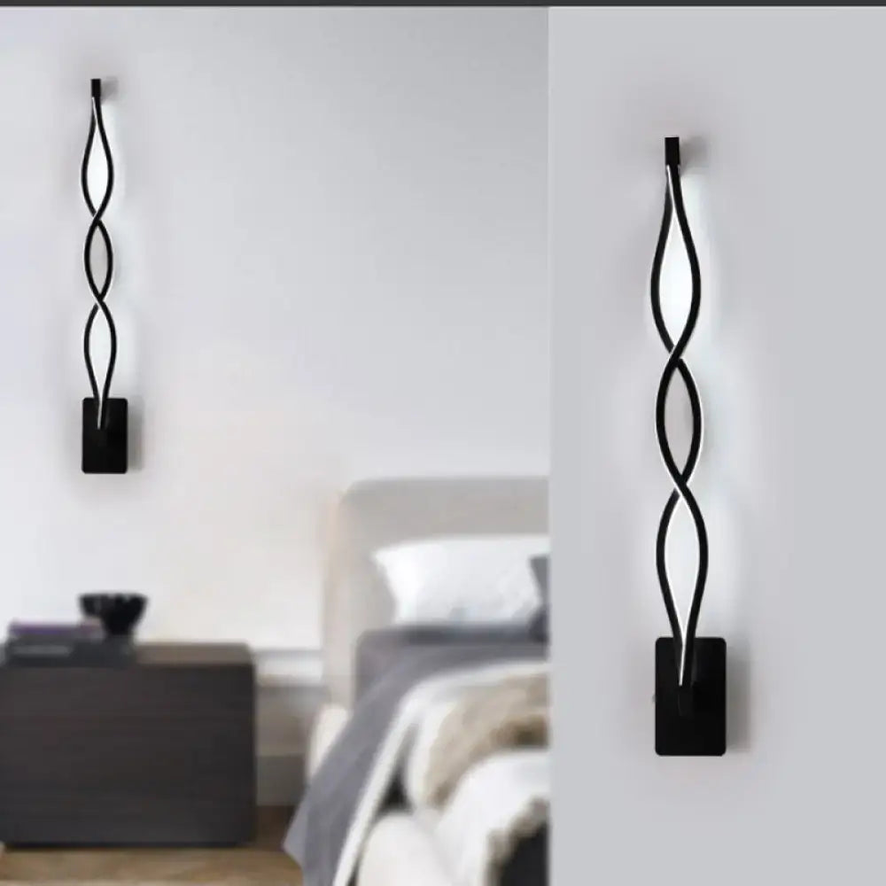 Modern twisted black led wall sconce with sleek design for bedroom lighting featuring energy-efficient led wall sconce technology