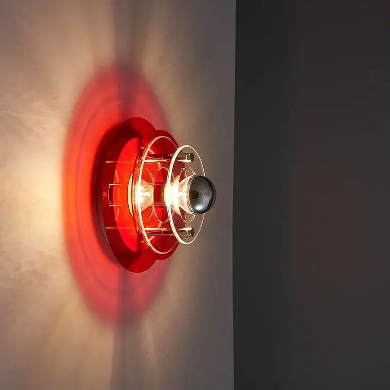 Modern ufo acrylic led wall lamp with red circular wall lamp featuring clear glass cage and metallic accents for decorbites led wall use