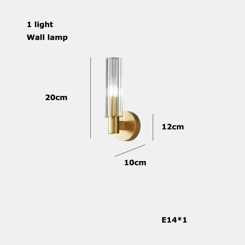 Gold-toned wall lamp with clear glass cylinder and brass base as part of modern vintage 2-layer chandelier lighting for dining room