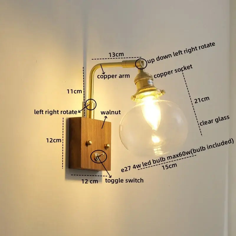 Modern walnut copper wall sconce with brass arm, clear glass bulb, and walnut wood base for stair lighting
