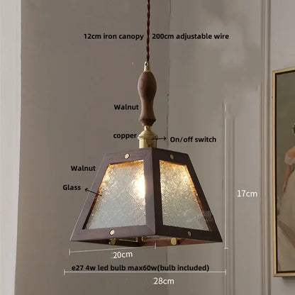 Modern walnut wood pendant light with clear glass panels and brass accents for dining room lighting