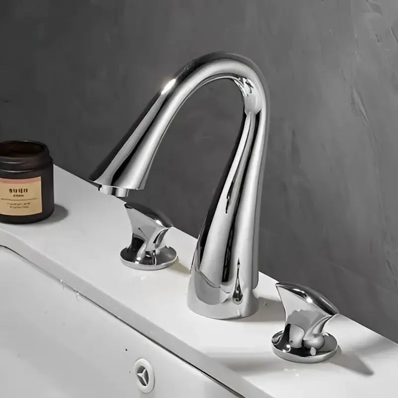 Modern waterfall black and gold basin faucet with chrome finish sleek curved spout and two matching decorbites black handles