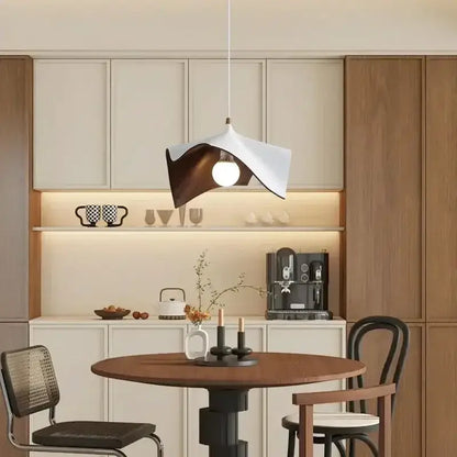 Modern wave black and bronze chandelier pendant light with sculptural folded design in white and dark wood for living room